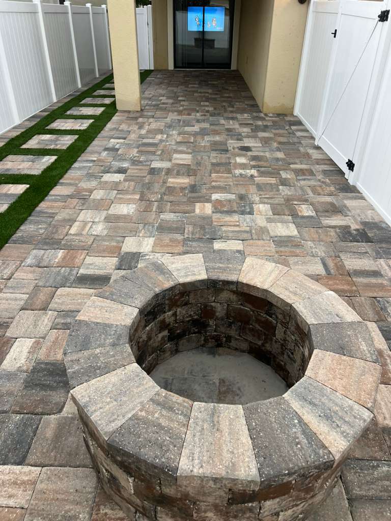 KS Solutions Paver Walkway with Fire Pit & Turf Inset install in Central Florida, FL