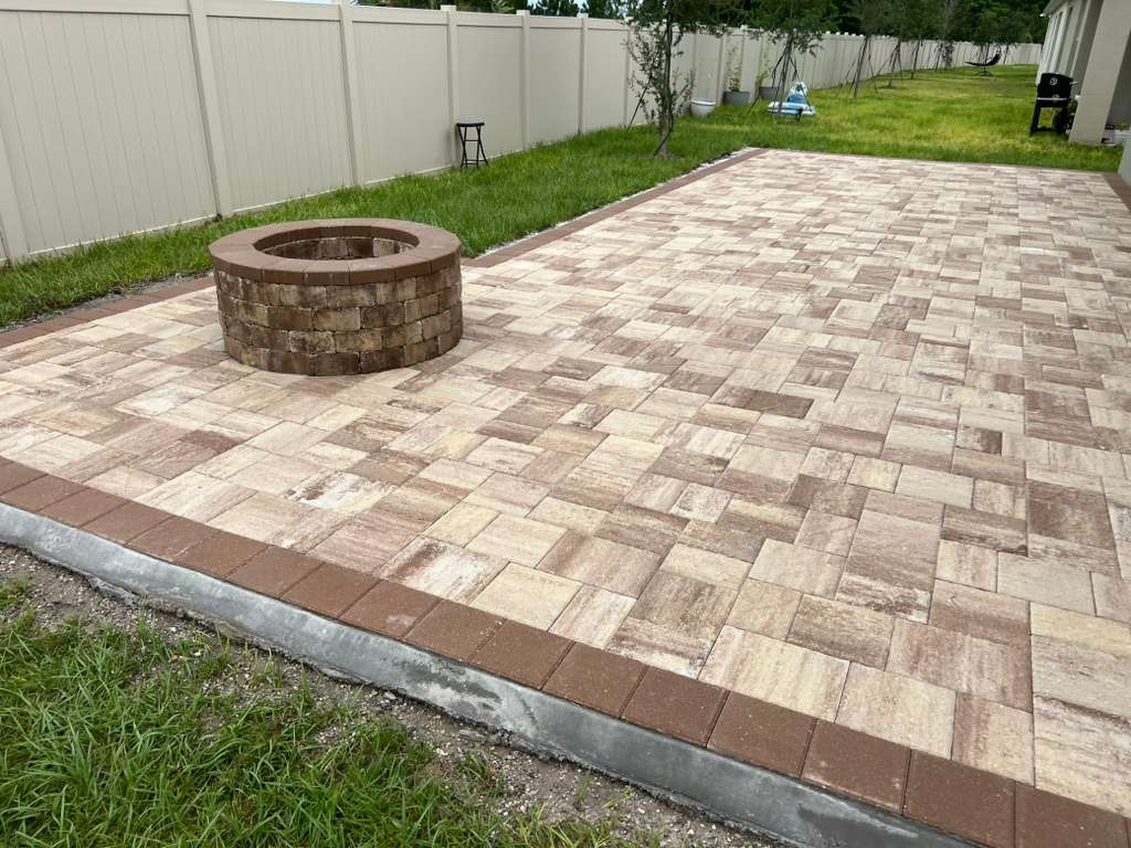 KS Solutions Tan Paver Patio with Round Fire Pit & Brown Border install in Central Florida, FL