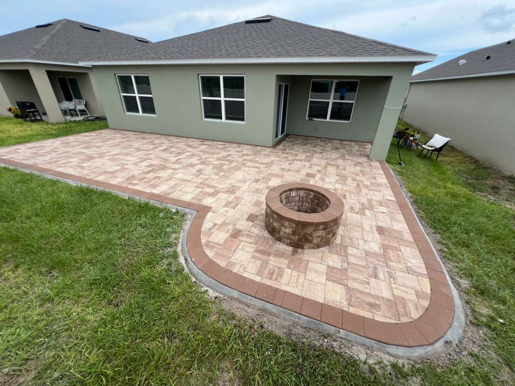 KS Solutions Travertine Backyard Patio with Fire Pit install in Central Florida, FL